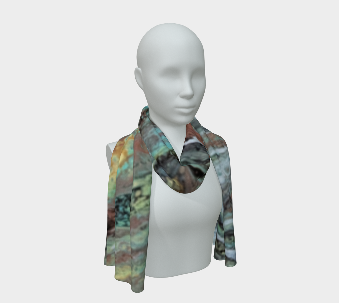 A multicolor abstract patterned scarf draped on a white mannequin torso against a light gray background.